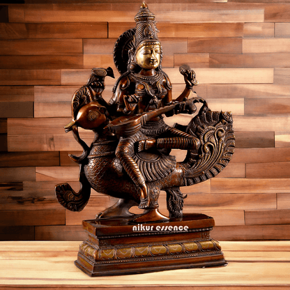 Saraswati Playing the Veena While Seated on a Grand Peacock, With a Parrot Gracefully Perched on Her Hand – Exquisite 20-Inch Handcrafted Figurine Nikuressence
