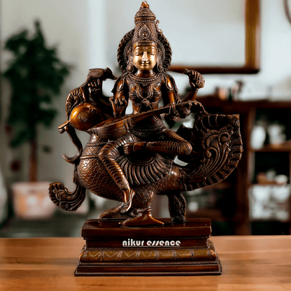 Saraswati Playing the Veena While Seated on a Grand Peacock, With a Parrot Gracefully Perched on Her Hand – Exquisite 20-Inch Handcrafted Figurine Nikuressence