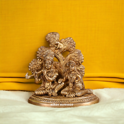 Solid Brass Radha Krishna Sitting with Tree idol - 14 cm Nikuressence
