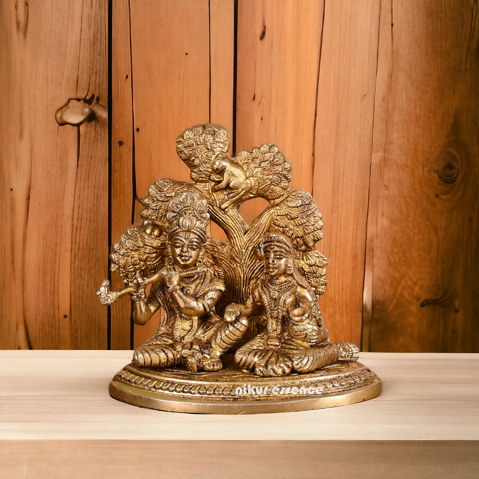 Solid Brass Radha Krishna Sitting with Tree idol - 14 cm Nikuressence