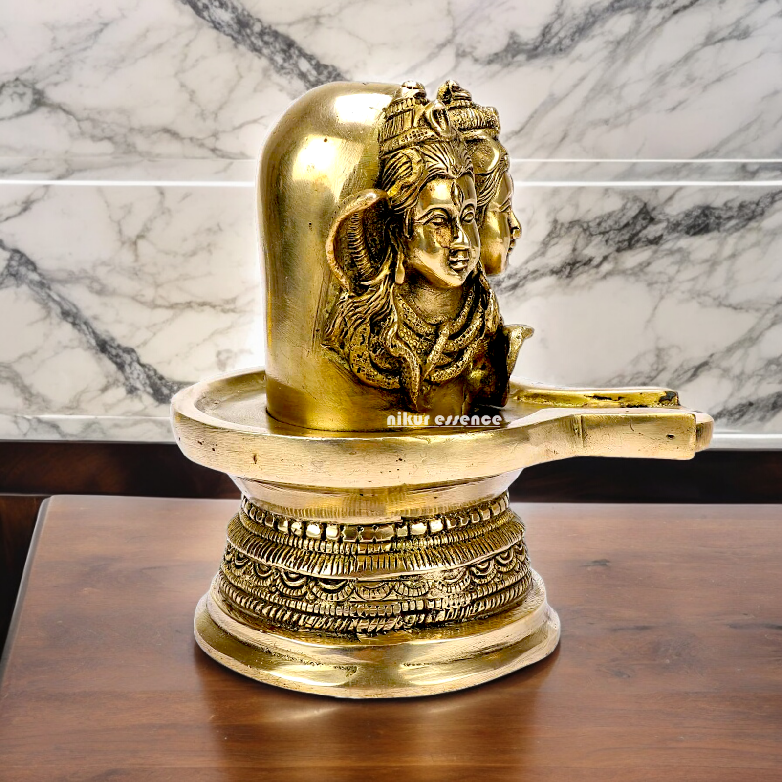 Solid Brass Shivling with Three Face Shiva idol on Shivling Idol - 16 cm Nikuressence