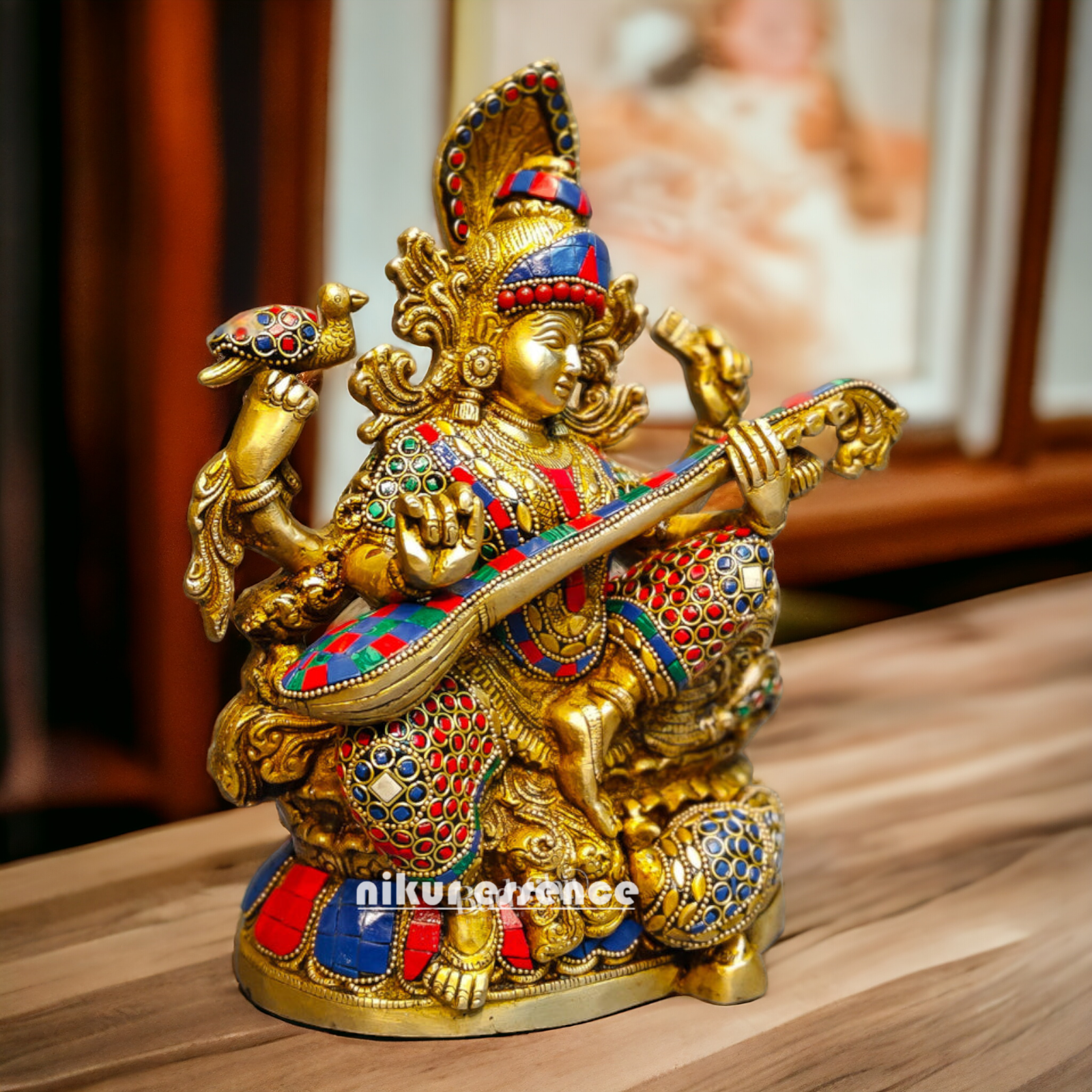 Buy Brass Saraswati Sitting Playing Veena with Stone Work - 27 cm Nikuressence