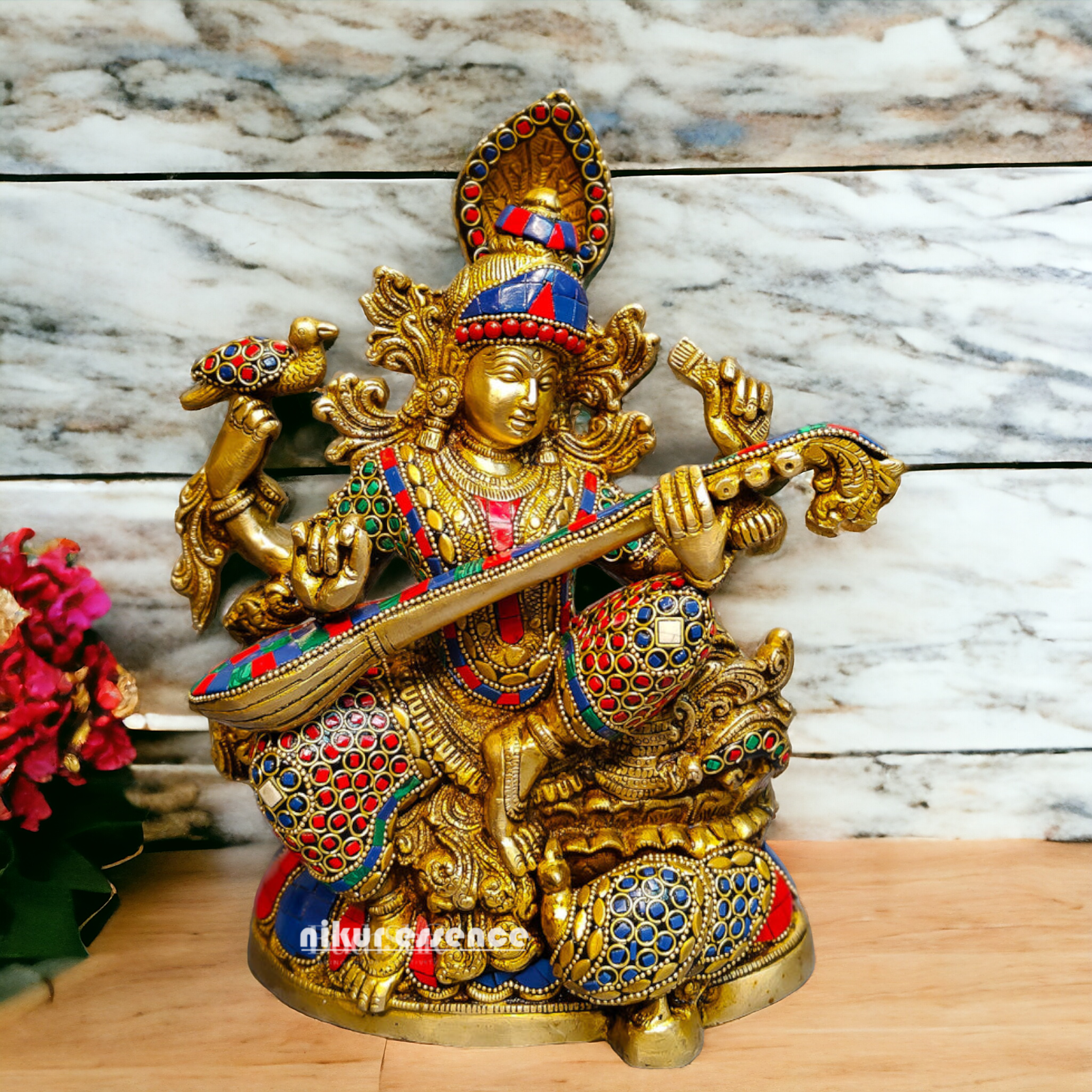 Buy Brass Saraswati Sitting Playing Veena with Stone Work - 27 cm Nikuressence