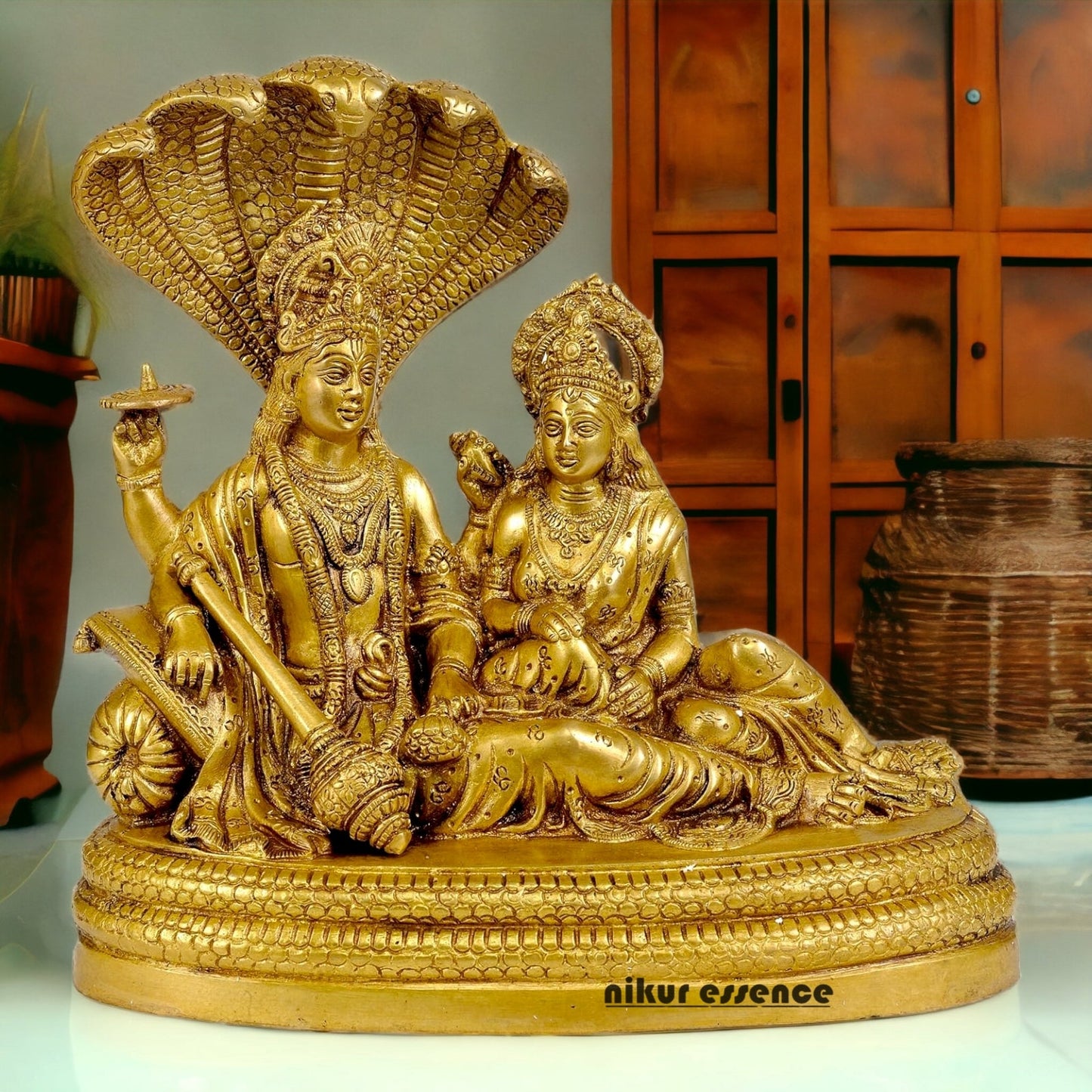 Shop Brass Vishnu Lakshmi Sitting on Sheshnag Idol - 10 inches Nikuressence
