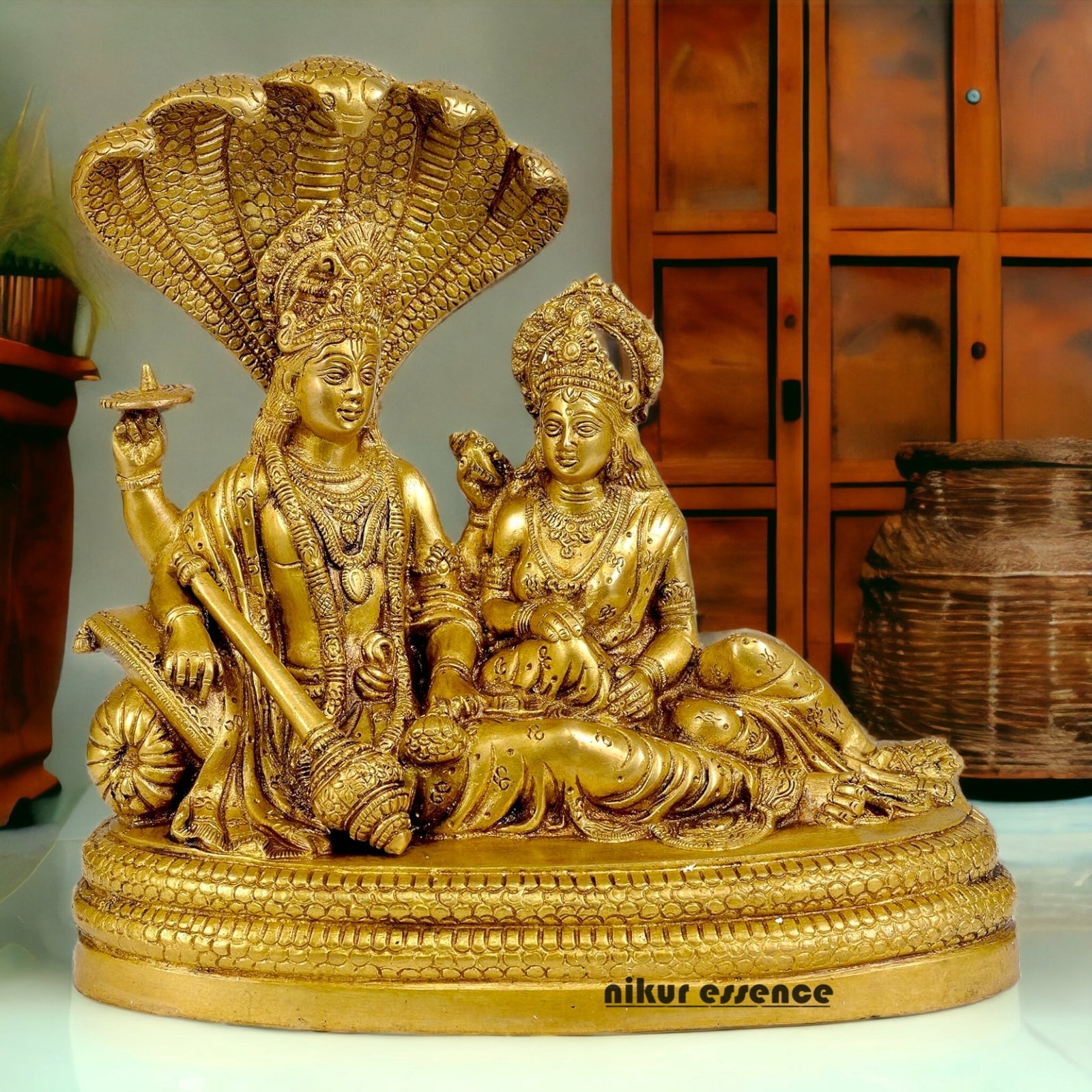 Shop Brass Vishnu Lakshmi Sitting on Sheshnag Idol - 10 inches Nikuressence