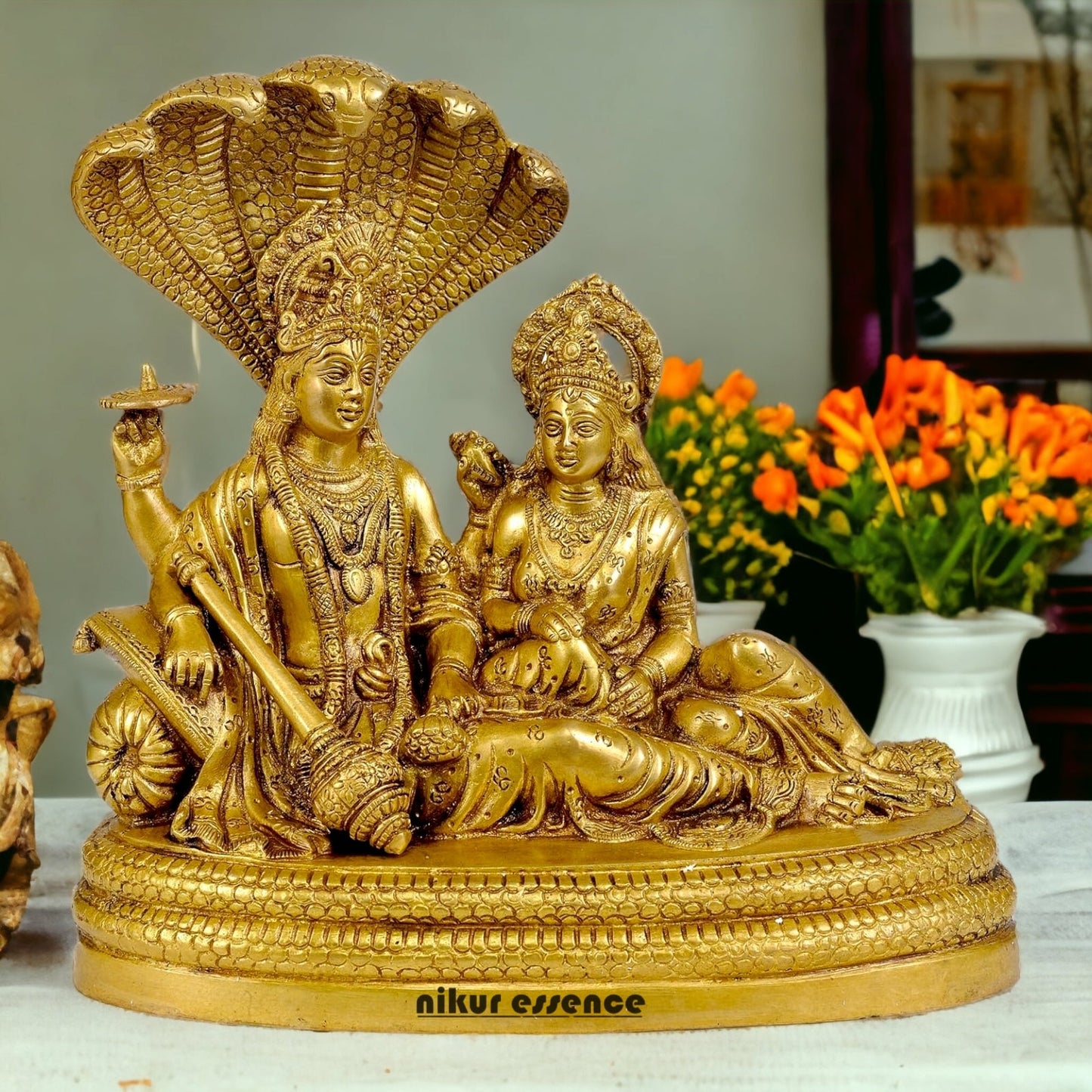 Shop Brass Vishnu Lakshmi Sitting on Sheshnag Idol - 10 inches Nikuressence