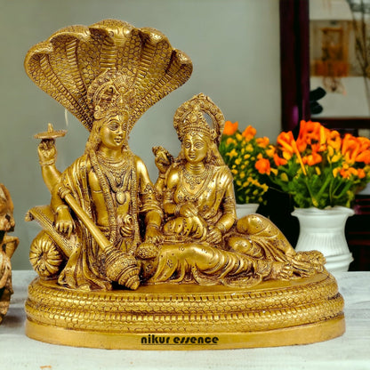 Shop Brass Vishnu Lakshmi Sitting on Sheshnag Idol - 10 inches Nikuressence