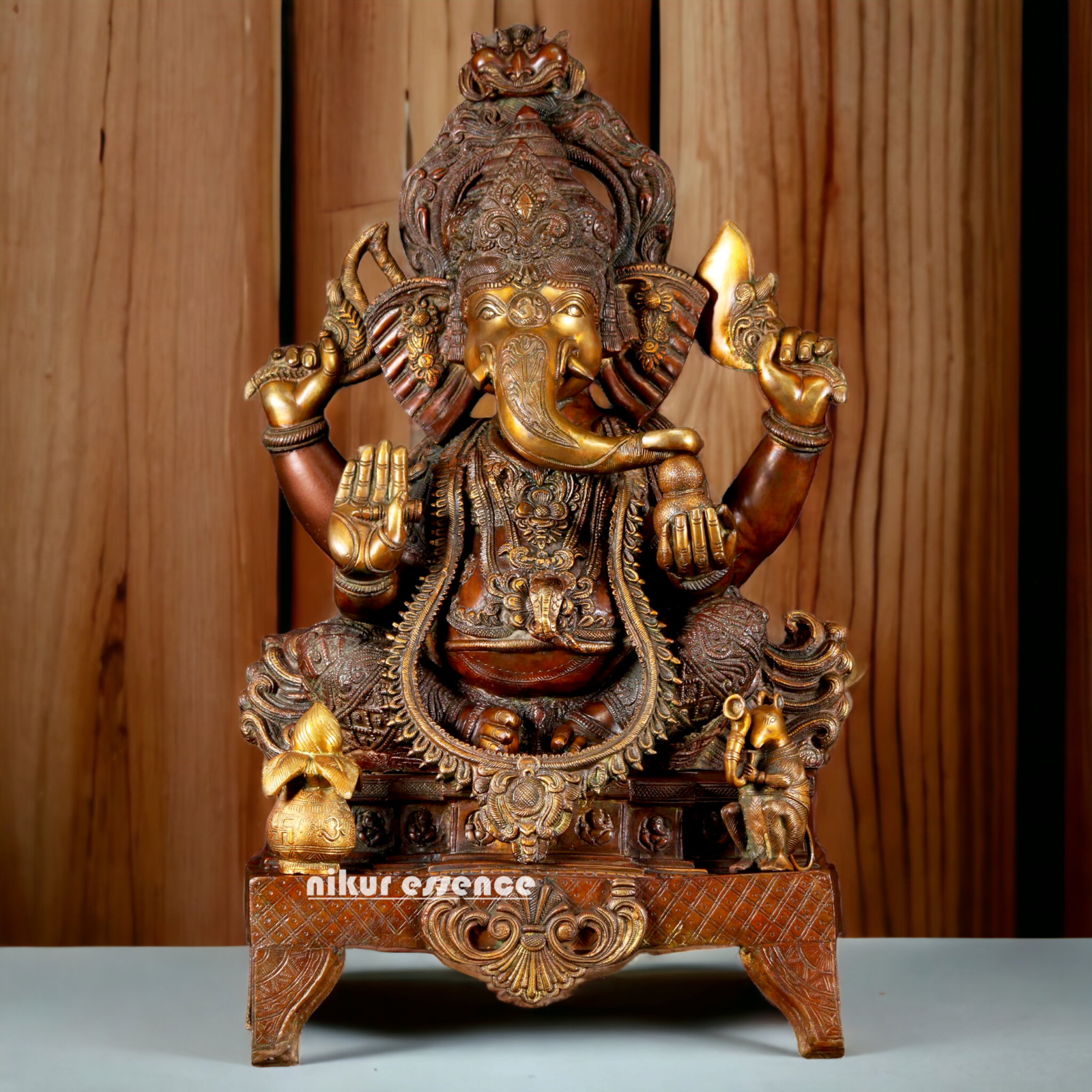 Buy Ganesh Sitting on Singhasan Brass Idol - 34.646 inches Nikuressence