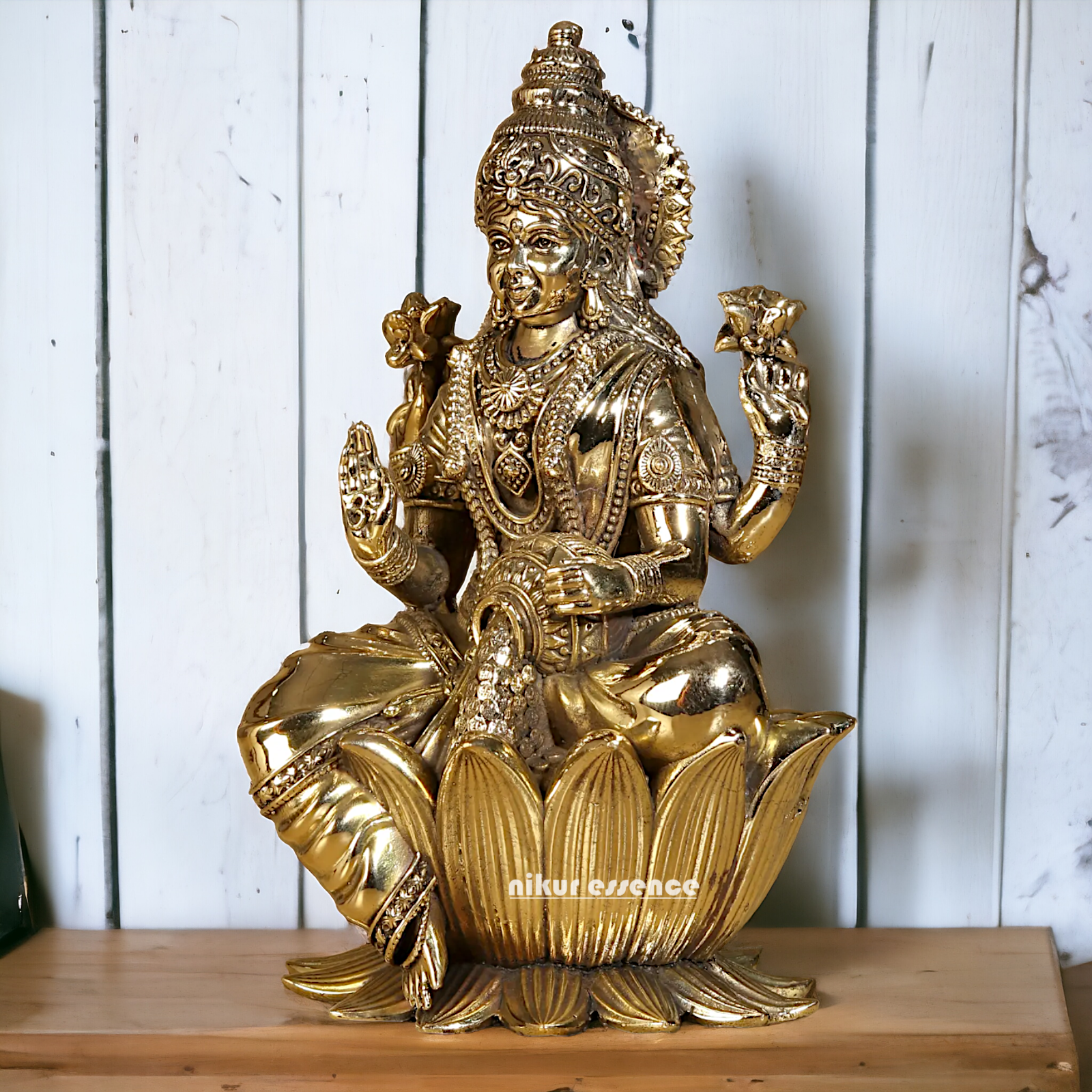 Superfine Brass Lakshmi Maa Sitting on Lotus Idol - 7.5 inches Nikuressence