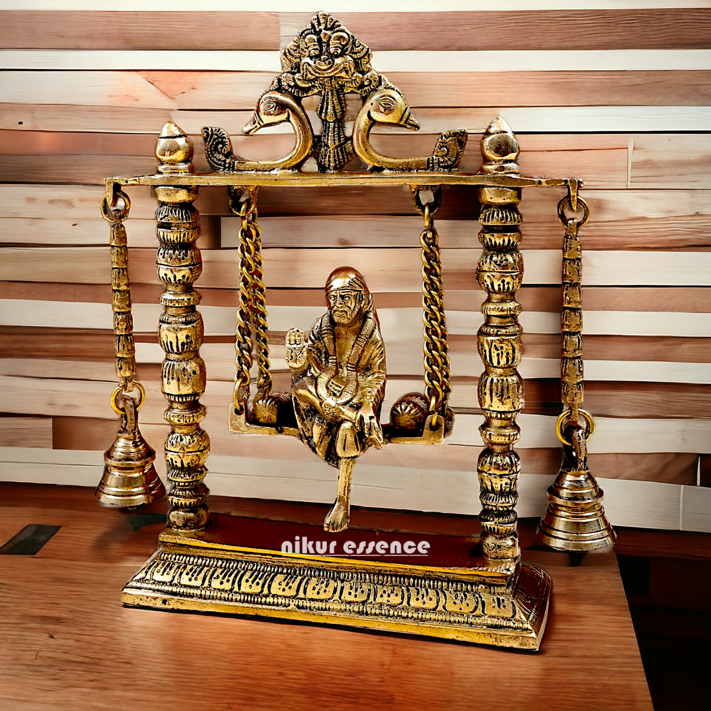 buy Sai Baba swinging Jhula Solid brass idol - 10 inches Nikuressence