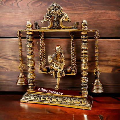 buy Sai Baba swinging Jhula Solid brass idol - 10 inches Nikuressence