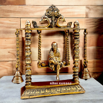 buy Sai Baba swinging Jhula Solid brass idol - 10 inches Nikuressence