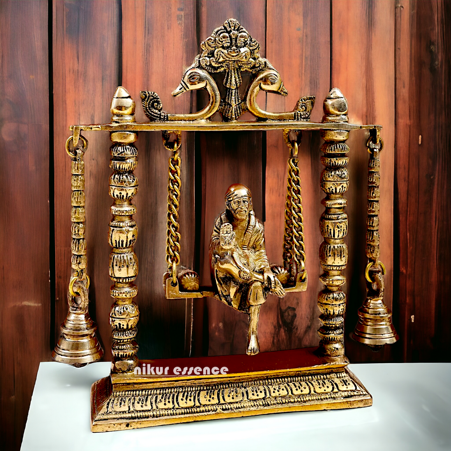 buy Sai Baba swinging Jhula Solid brass idol - 10 inches Nikuressence