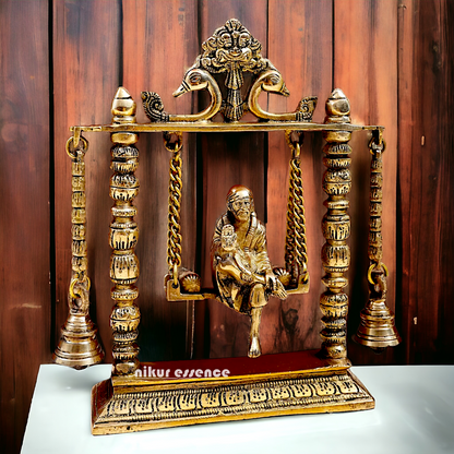 buy Sai Baba swinging Jhula Solid brass idol - 10 inches Nikuressence