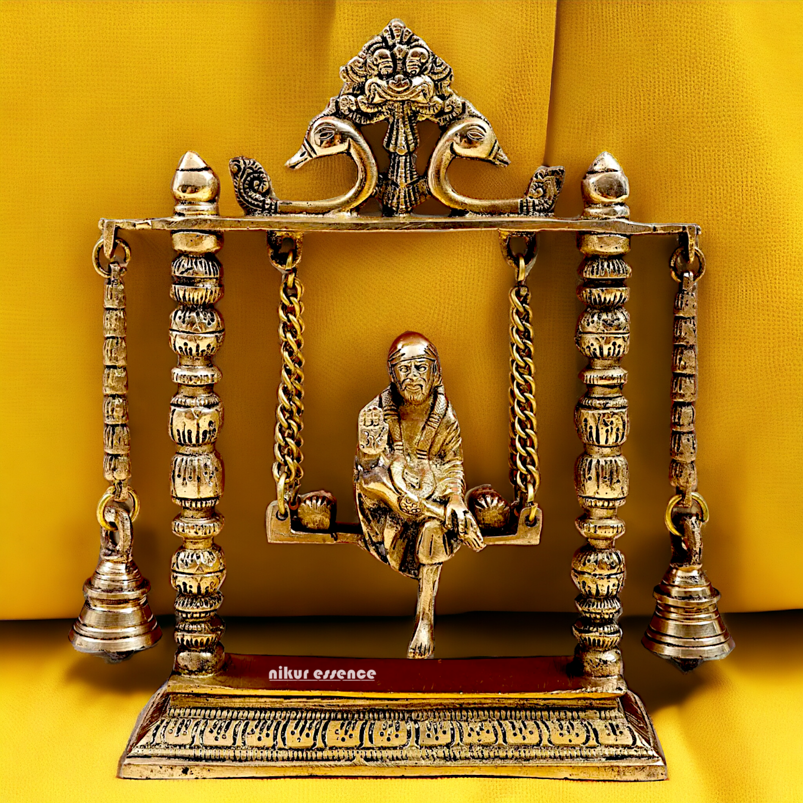 buy Sai Baba swinging Jhula Solid brass idol - 10 inches Nikuressence
