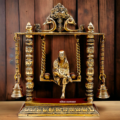 buy Sai Baba swinging Jhula Solid brass idol - 10 inches Nikuressence