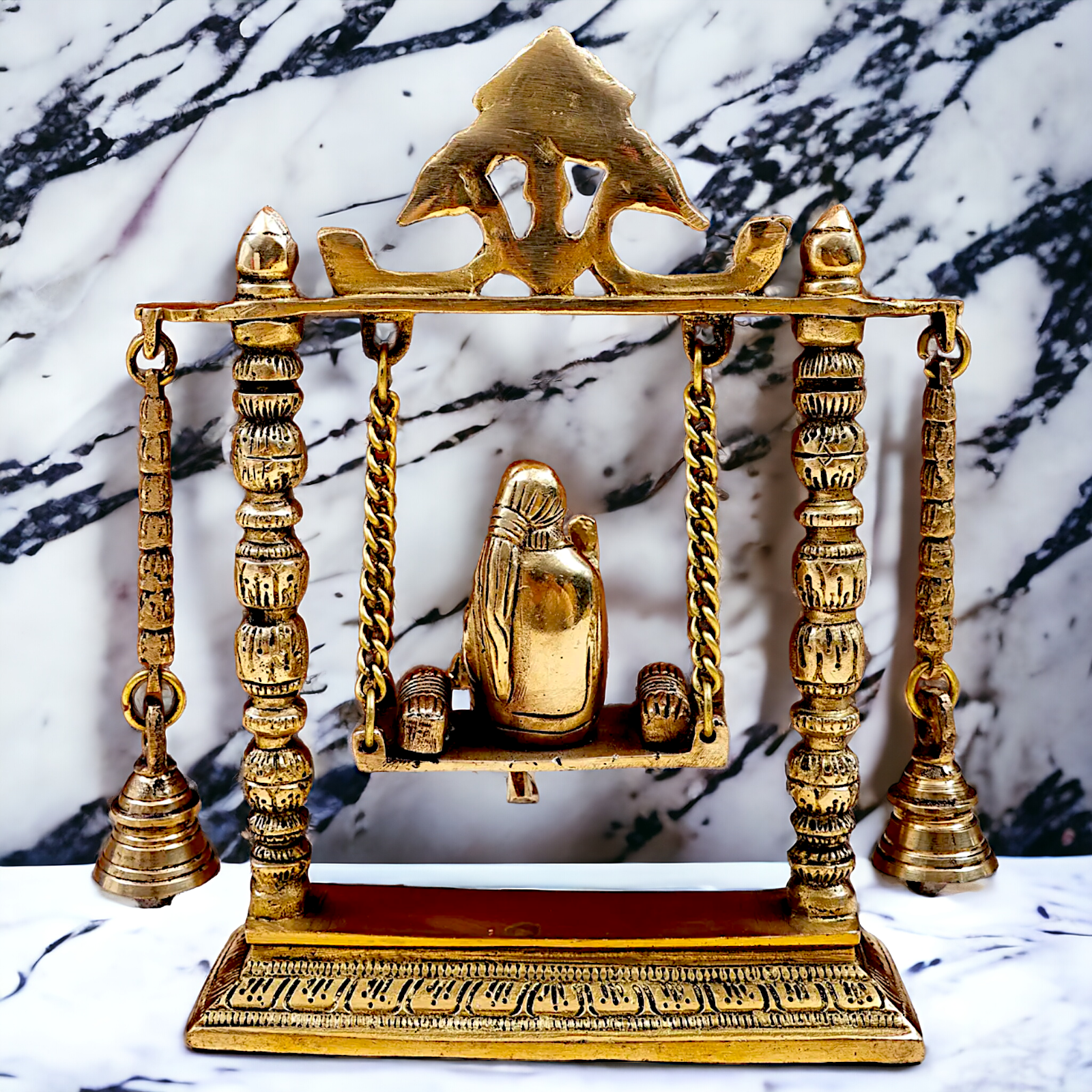 buy Sai Baba swinging Jhula Solid brass idol - 10 inches Nikuressence