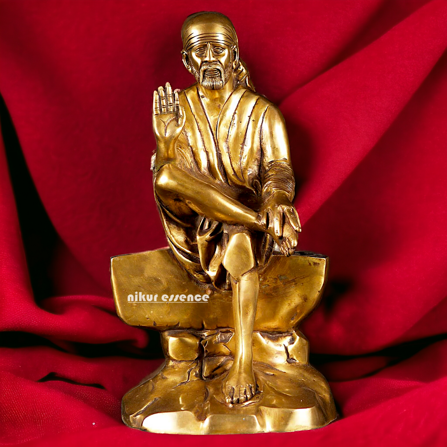 Pure Brass Sai Baba Sitting on Stone idol - 12 inches Nikuressence