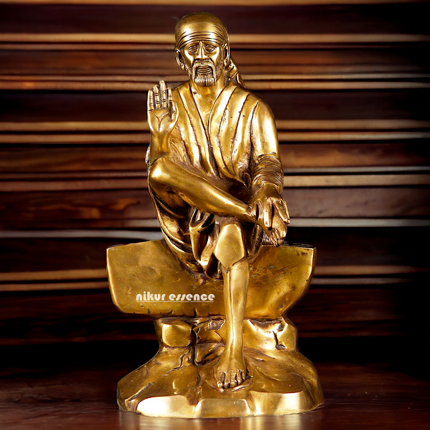 Pure Brass Sai Baba Sitting on Stone idol - 12 inches Nikuressence