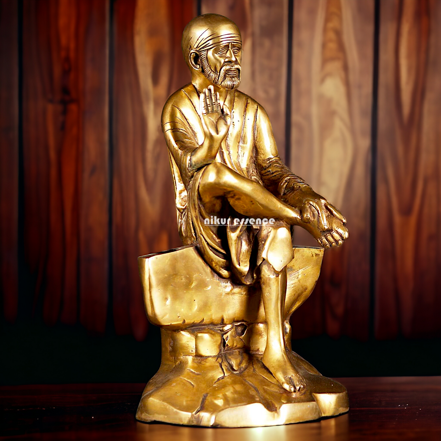 Pure Brass Sai Baba Sitting on Stone idol - 12 inches Nikuressence