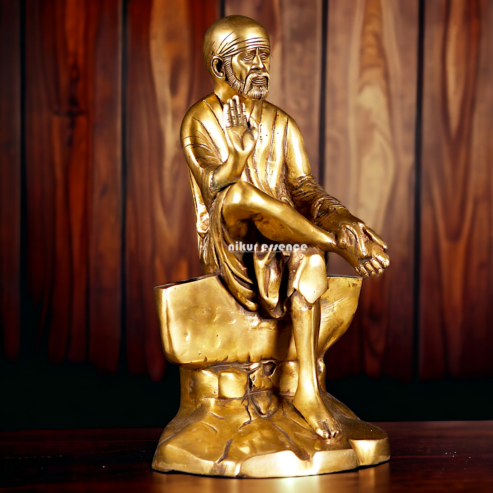 Pure Brass Sai Baba Sitting on Stone idol - 12 inches Nikuressence
