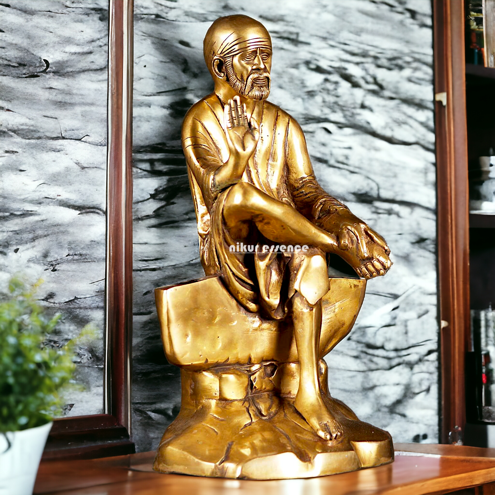 Pure Brass Sai Baba Sitting on Stone idol - 12 inches Nikuressence
