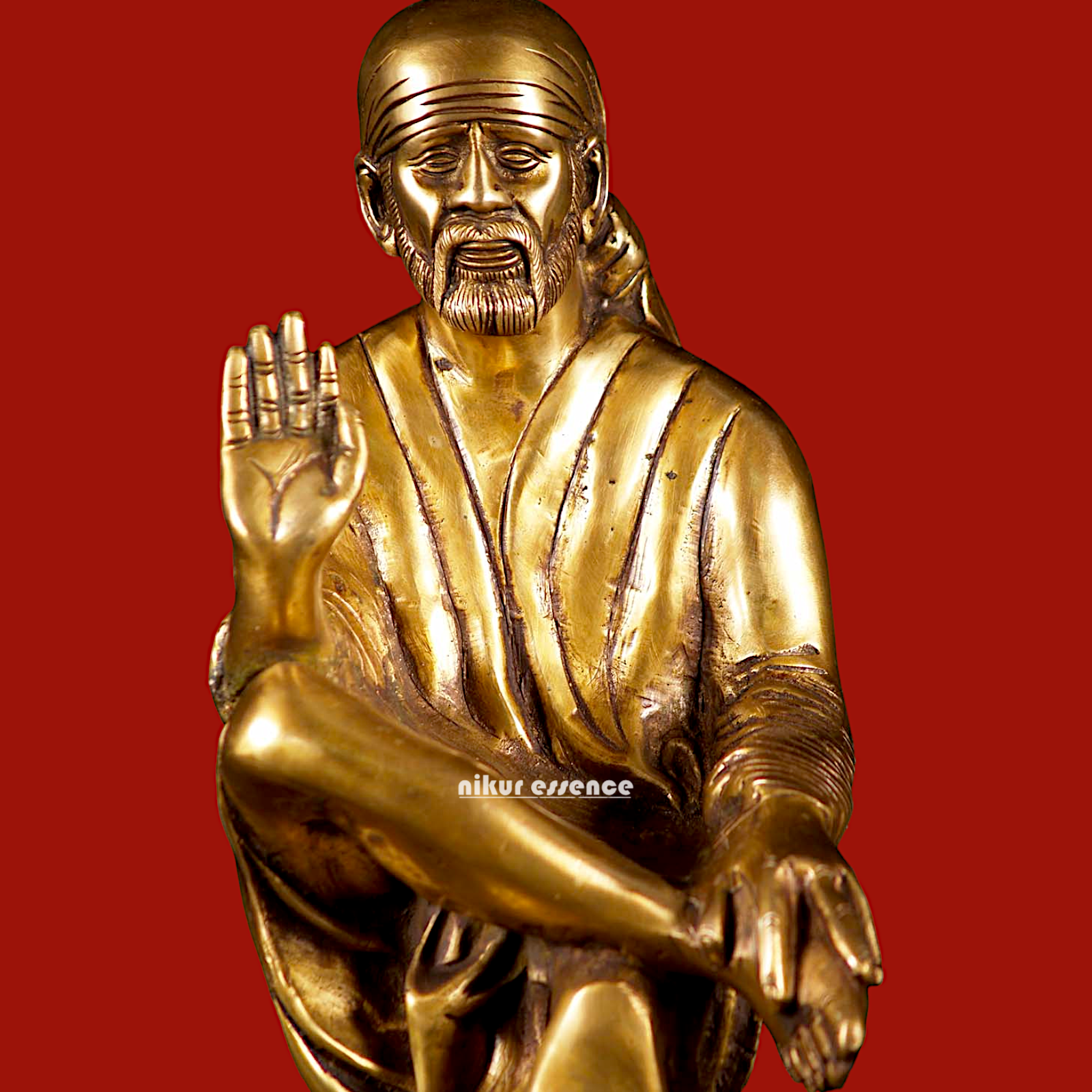Pure Brass Sai Baba Sitting on Stone idol - 12 inches Nikuressence