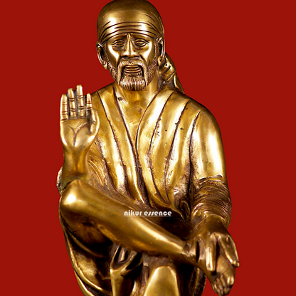 Pure Brass Sai Baba Sitting on Stone idol - 12 inches Nikuressence