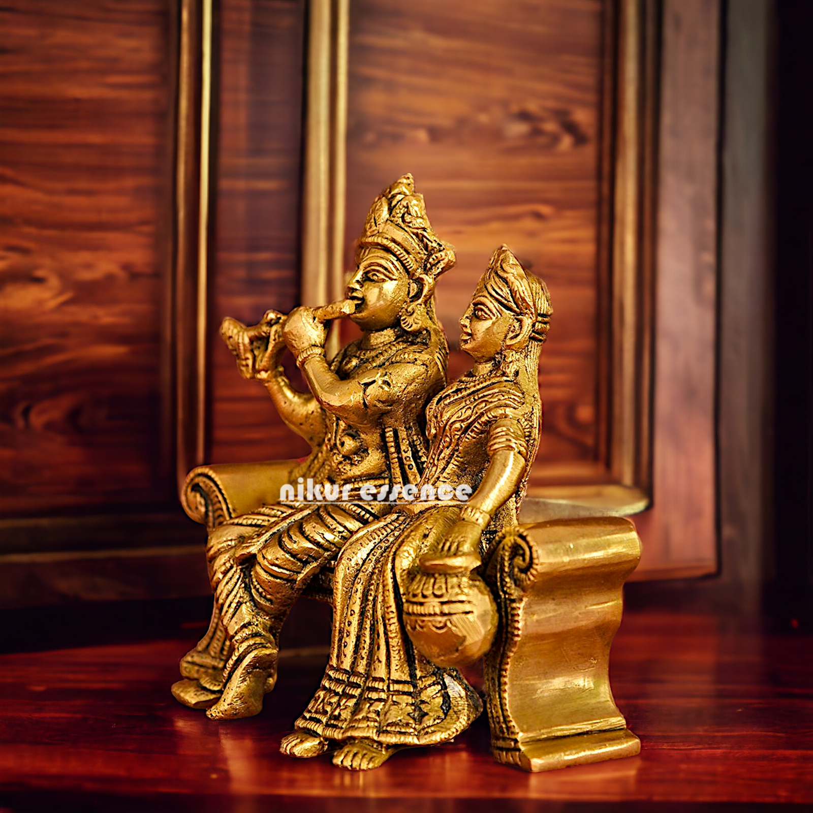 Lord Radha Krishna Sitting on Sofa brass Idol - 6 inches Nikuressence