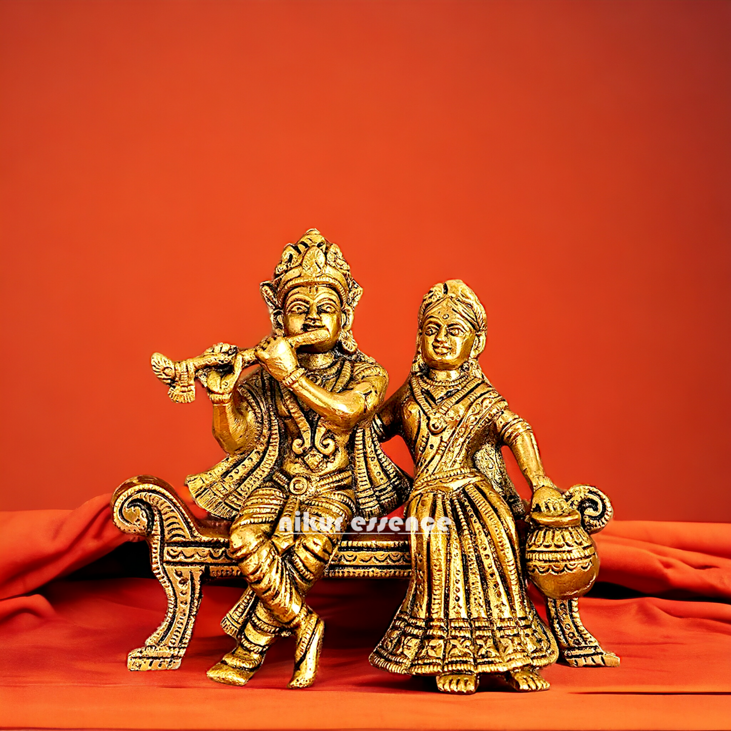 Lord Radha Krishna Sitting on Sofa brass Idol - 6 inches Nikuressence