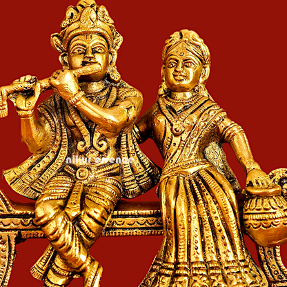 Lord Radha Krishna Sitting on Sofa brass Idol - 6 inches Nikuressence