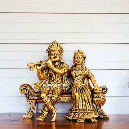 Lord Radha Krishna Sitting on Sofa brass Idol - 6 inches Nikuressence