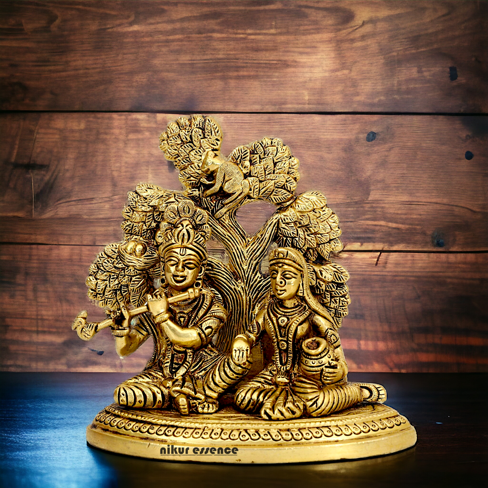 Shop Radha Krishna Sitting with Tree solid Brass idol - 5.5 inch Nikuressence