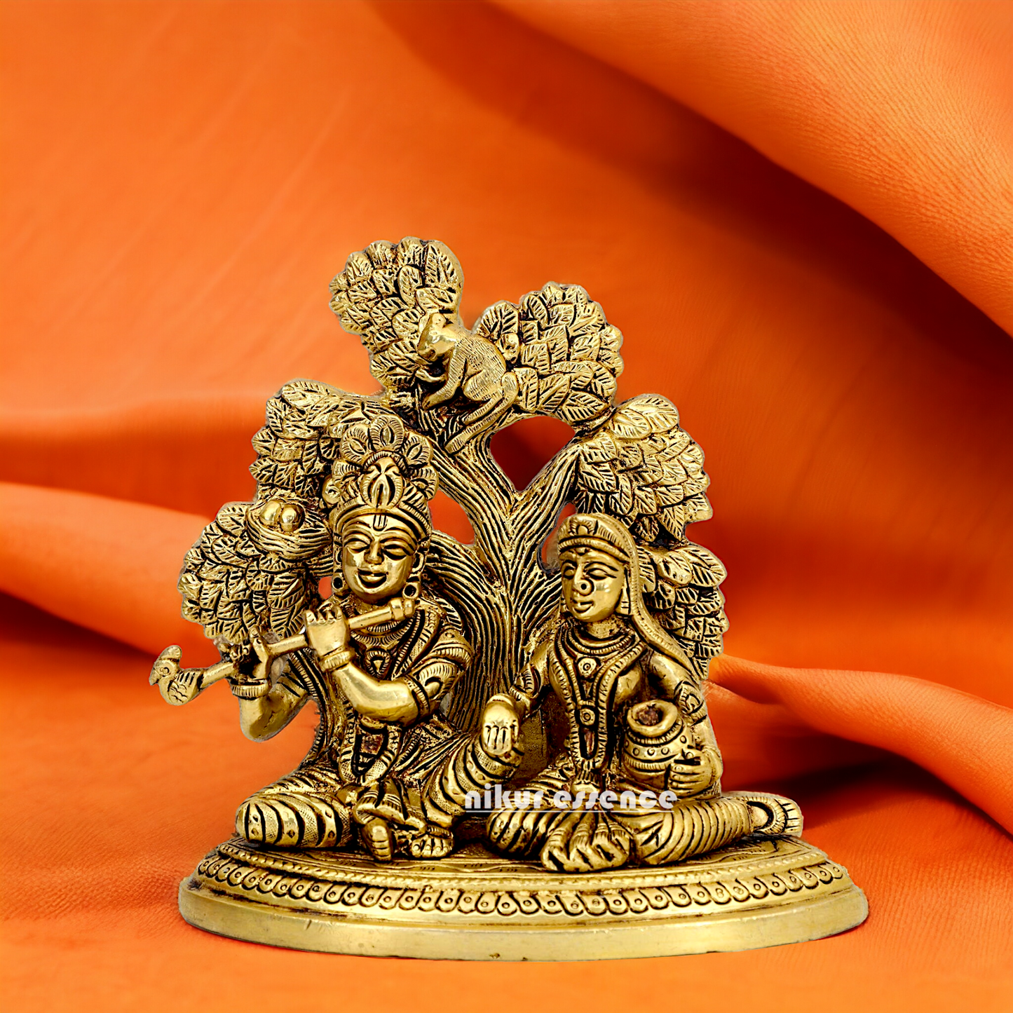 Shop Radha Krishna Sitting with Tree solid Brass idol - 5.5 inch Nikuressence