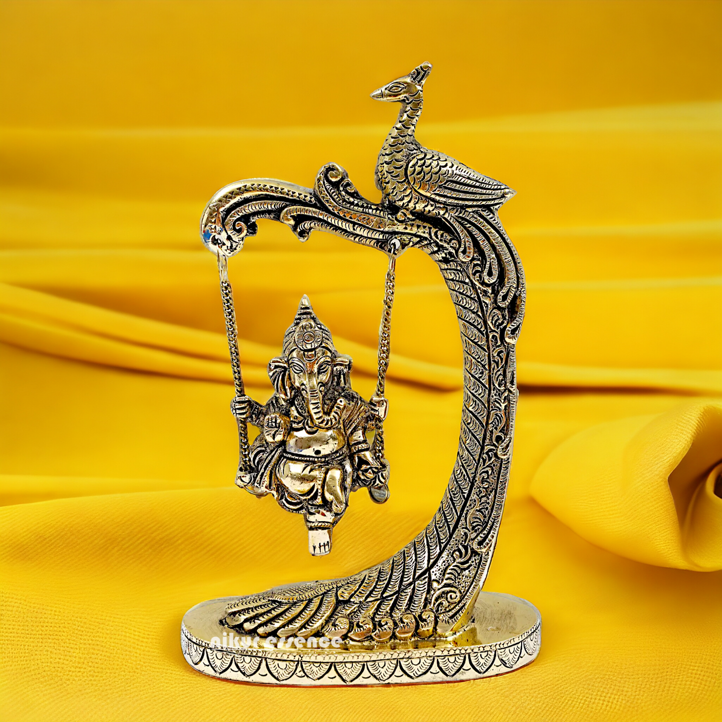 Lord Ganpati swinging Jhula Brass idol - 9 Inches Nikuressence