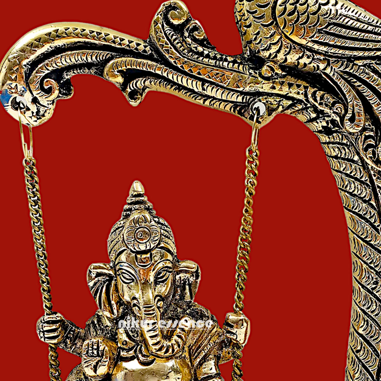 Lord Ganpati swinging Jhula Brass idol - 9 Inches Nikuressence