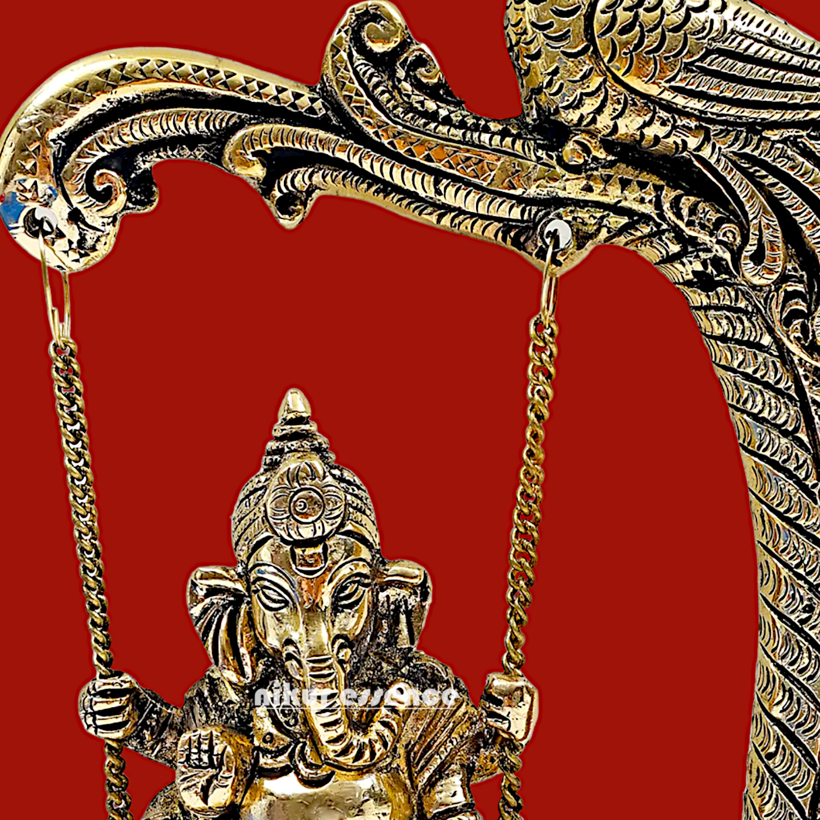 Lord Ganpati swinging Jhula Brass idol - 9 Inches Nikuressence