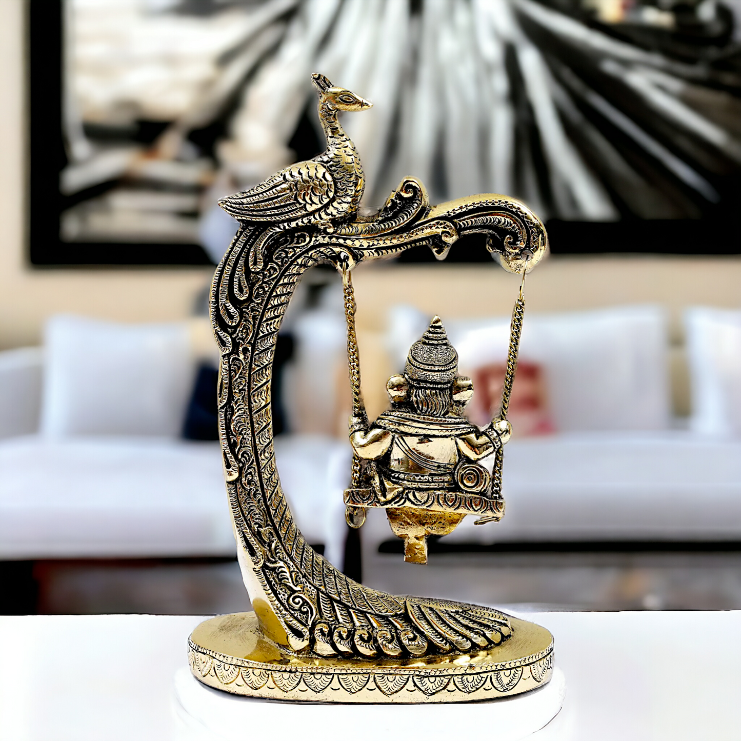 Lord Ganpati swinging Jhula Brass idol - 9 Inches Nikuressence