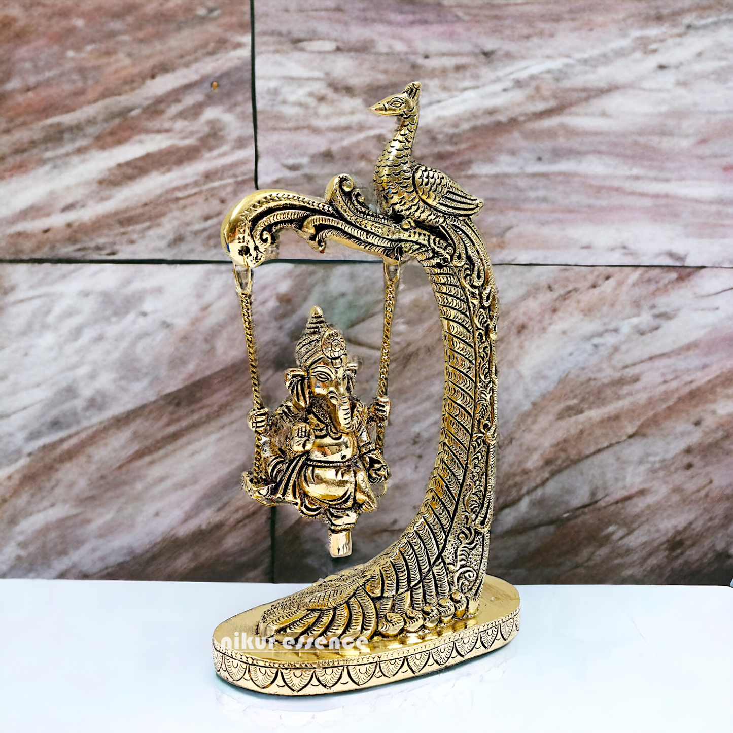 Lord Ganpati swinging Jhula Brass idol - 9 Inches Nikuressence