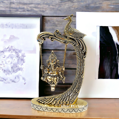 Lord Ganpati swinging Jhula Brass idol - 9 Inches Nikuressence