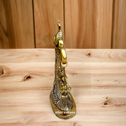 Lord Ganpati swinging Jhula Brass idol - 9 Inches Nikuressence