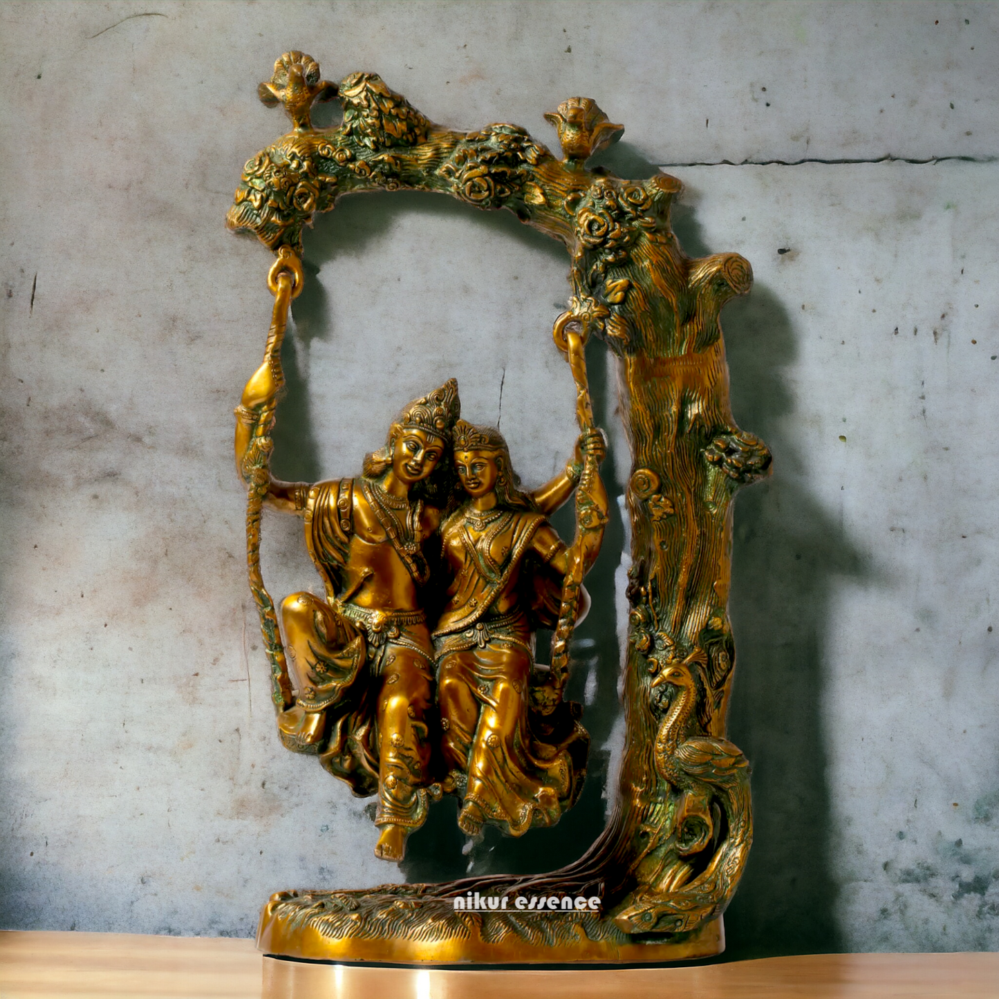 Brass Radha Krishna Sitting on Jhula Swinging Idol - 22.7 inches Nikuressence