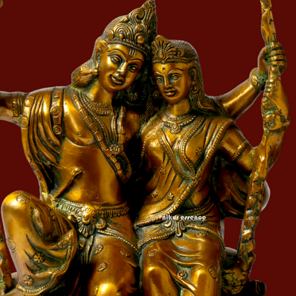 Brass Radha Krishna Sitting on Jhula Swinging Idol - 22.7 inches Nikuressence