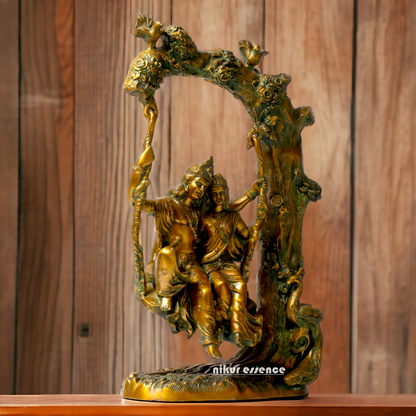 Brass Radha Krishna Sitting on Jhula Swinging Idol - 22.7 inches Nikuressence