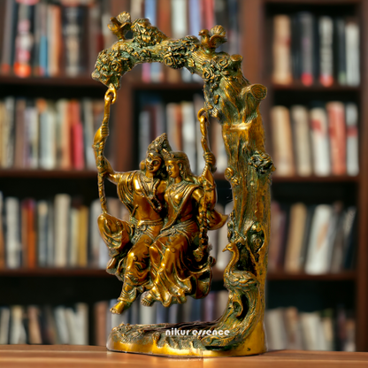Brass Radha Krishna Sitting on Jhula Swinging Idol - 22.7 inches Nikuressence