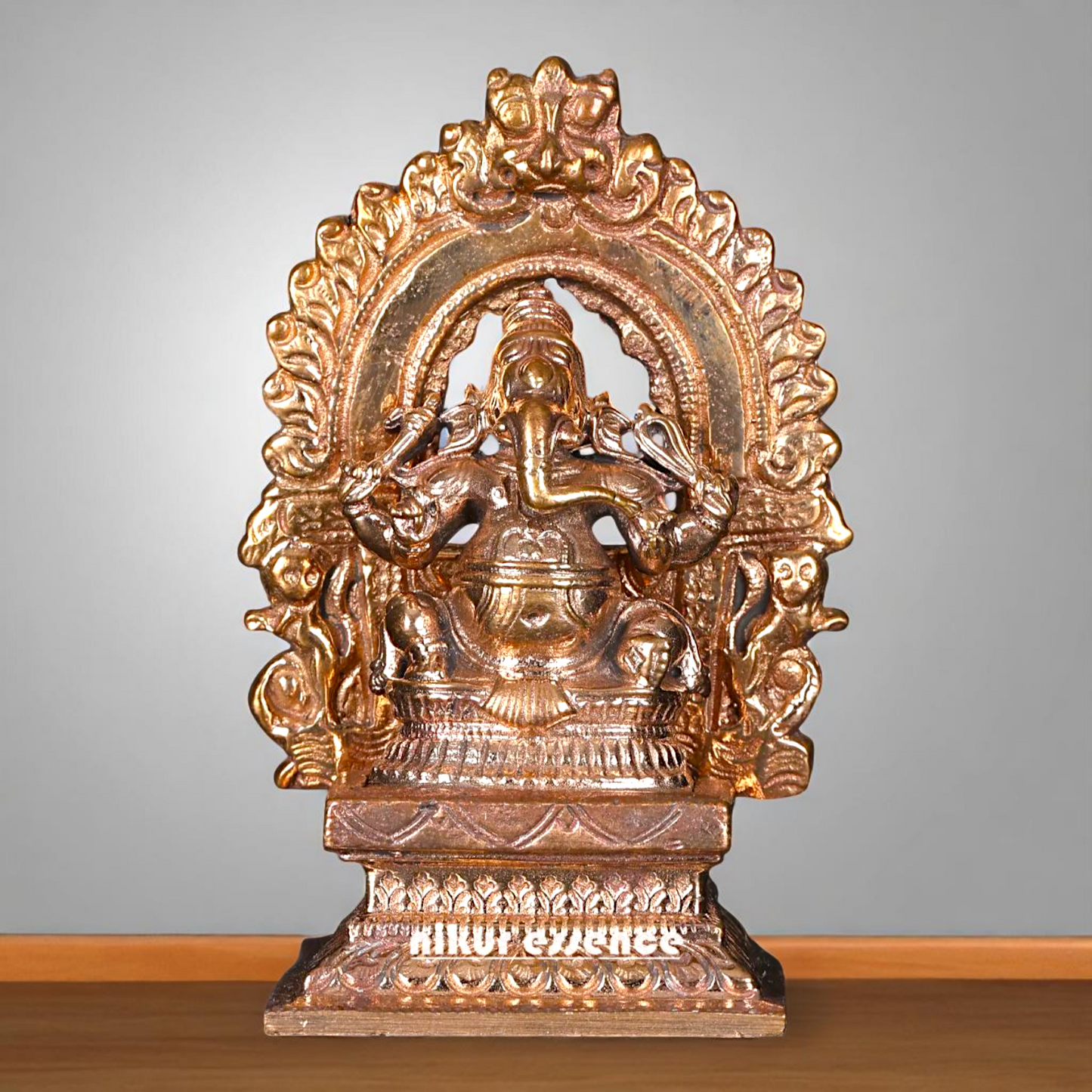 Bronze Ganesha Seated on kirtimukha throne with Four Armed statue - 3 Inches Nikuressence
