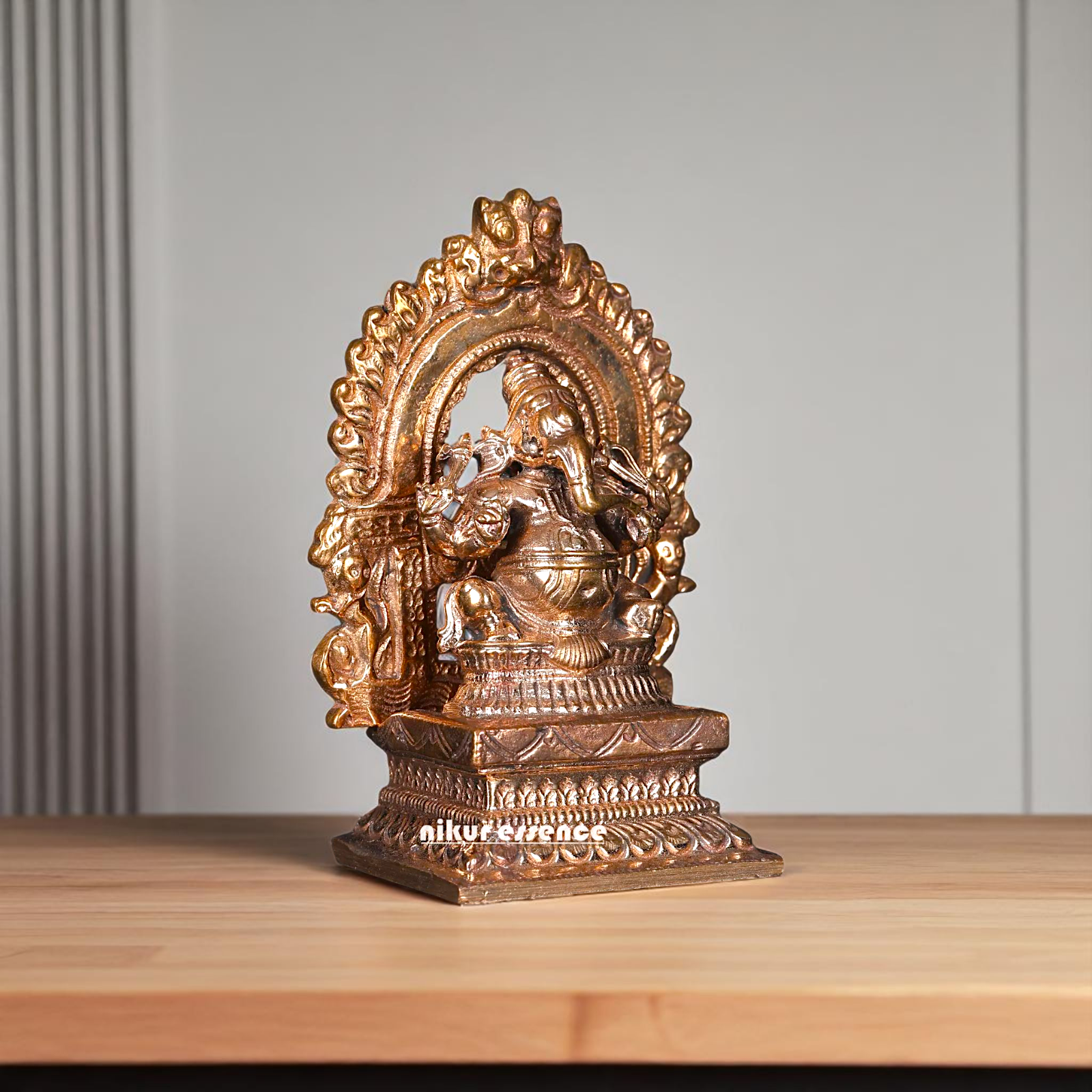 Bronze Ganesha Seated on kirtimukha throne with Four Armed statue - 3 Inches Nikuressence