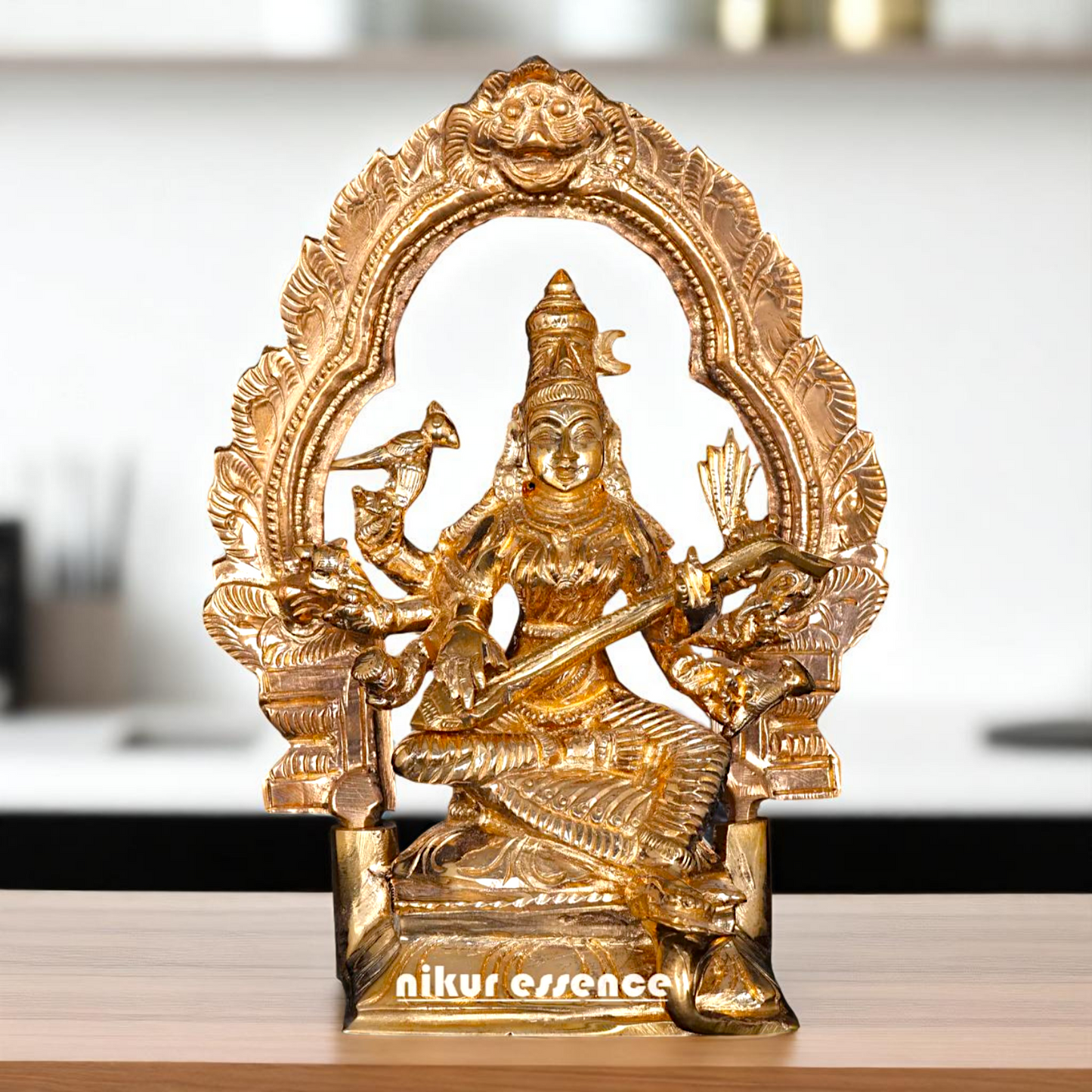 Bronze/Panchaloha Matangi seated with Playing Veena idol - 6 Inches Nikuressence