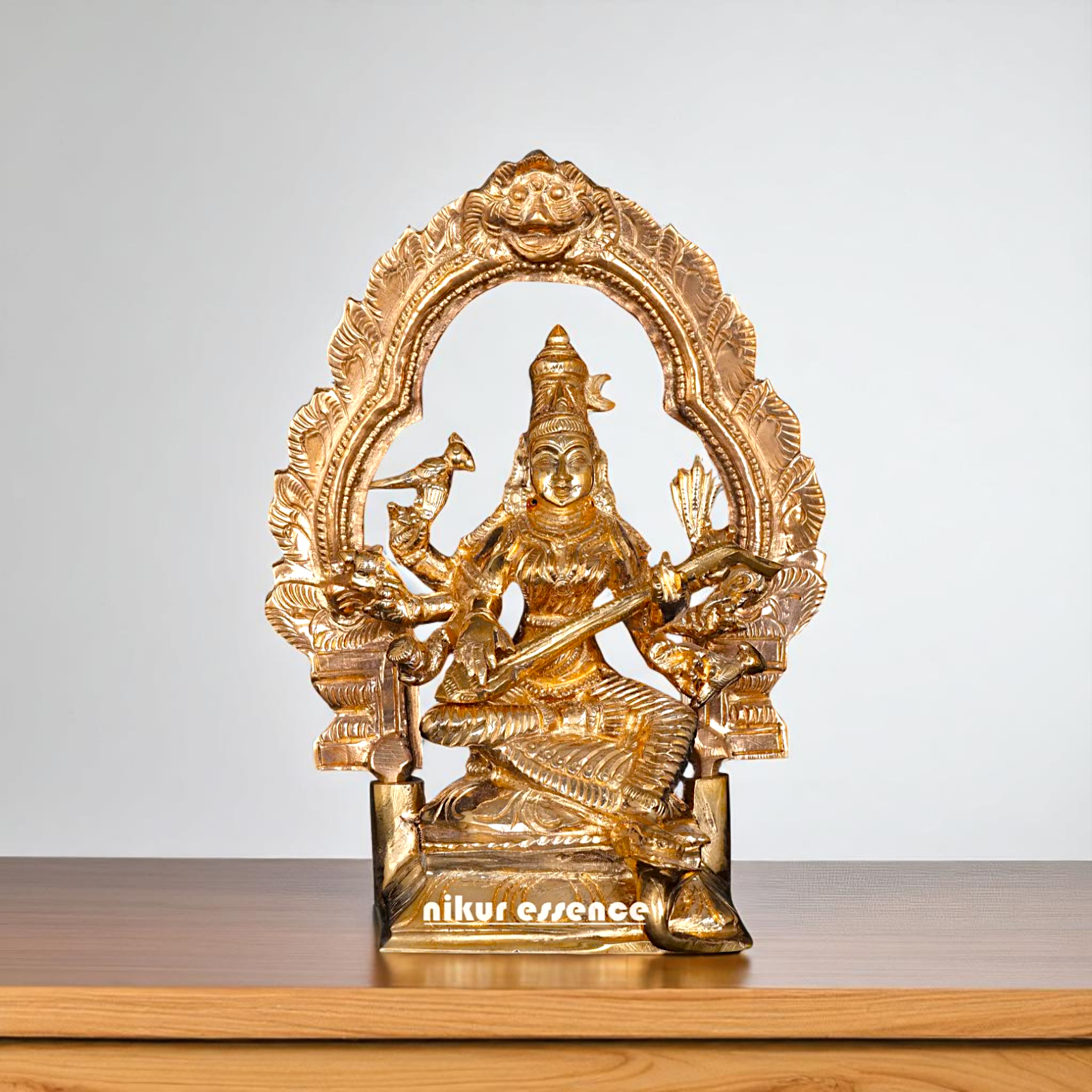 Bronze/Panchaloha Matangi seated with Playing Veena idol - 6 Inches Nikuressence