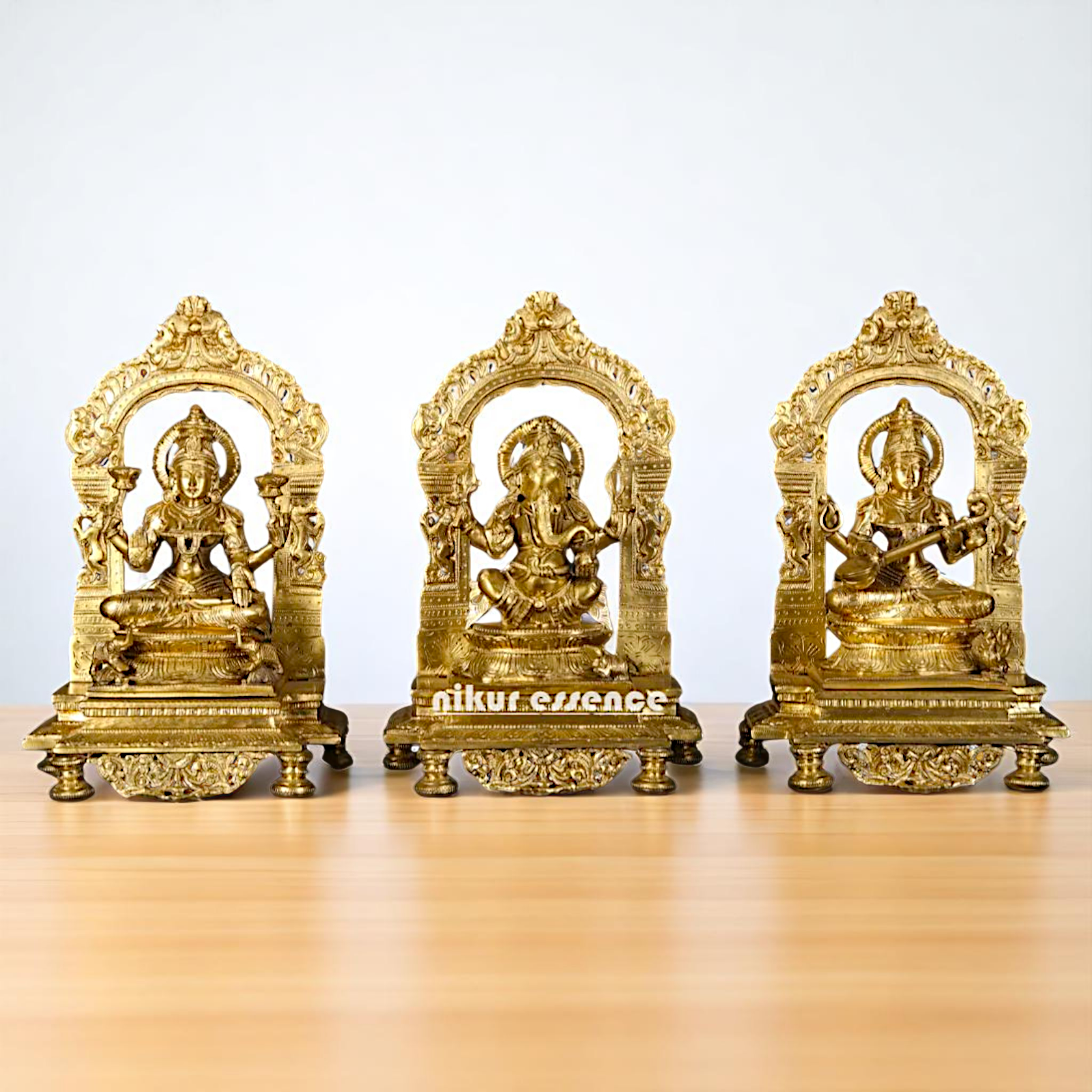 Goddess Lakshmi Ganesha Saraswati Seated on throne kirtimukha with Blessing Bronze/Panchaloha idol - 1 Feet Nikuressence